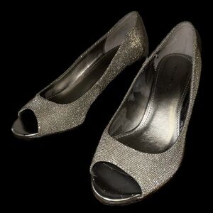 Women’s size 7 silver wedge heels by Bandolino